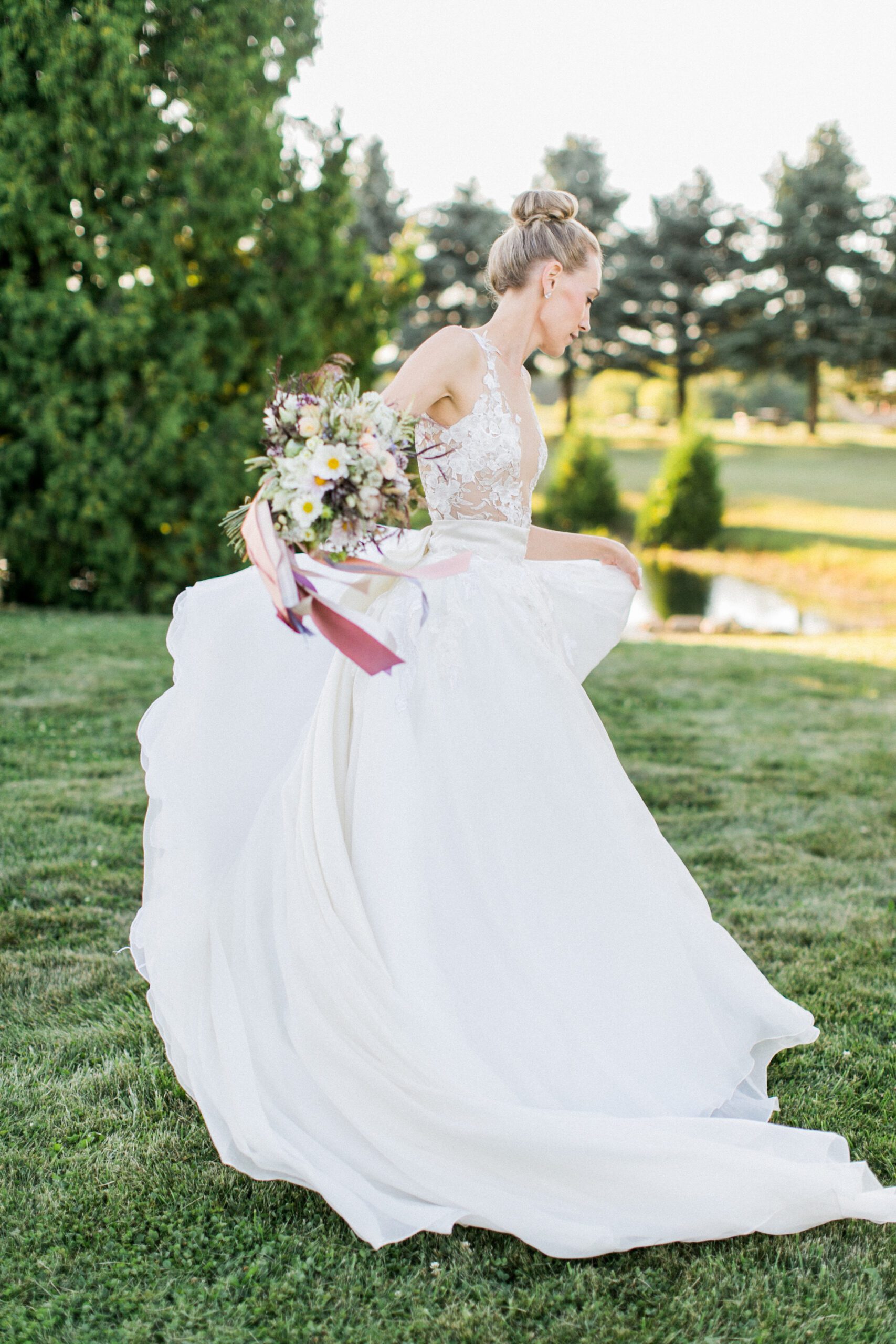 A bride spins for wedding photography near traverse city, michigan