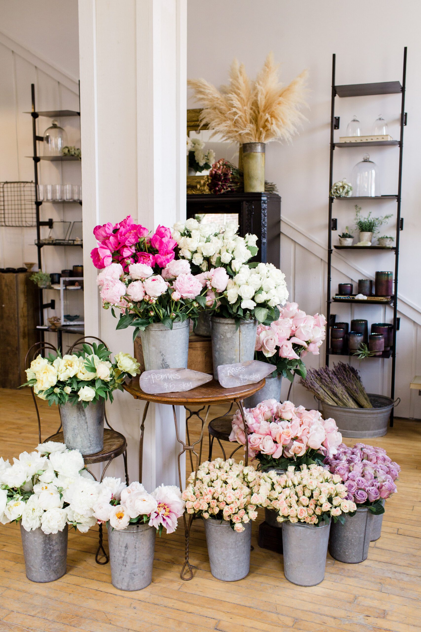 A photograph showing an array of beautiful flowers inside a business for brand photography