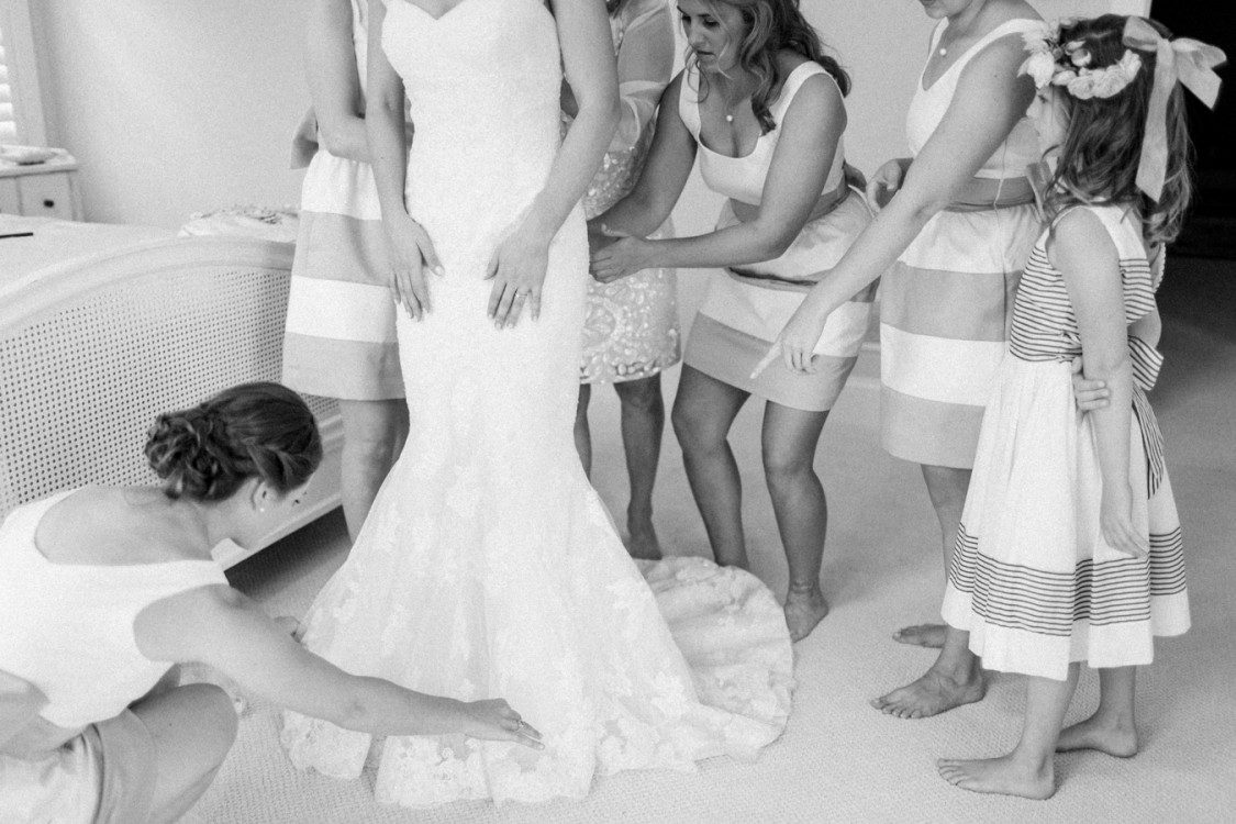 a bride gets ready with bridal party